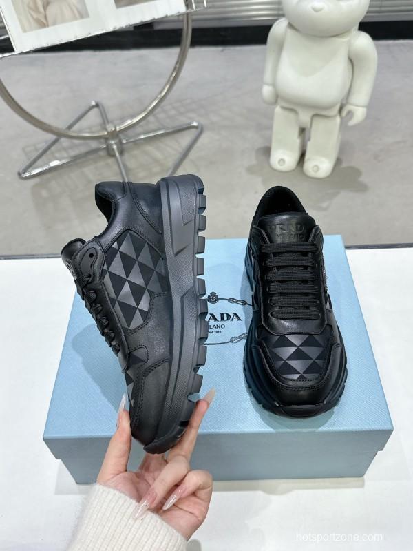 2025 Unisex Prada Black Leather Sneakers KFY00310